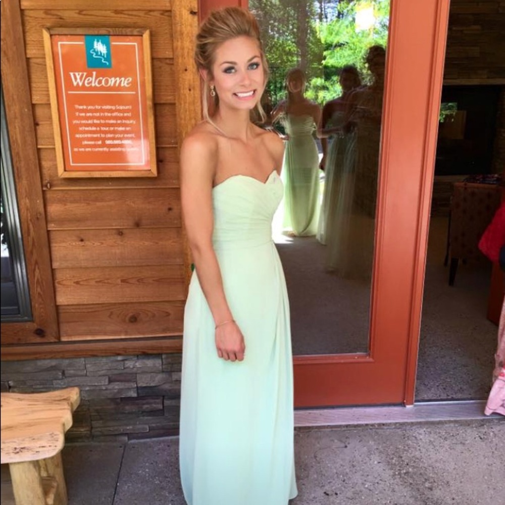 Two bridesmaids dresses light green.